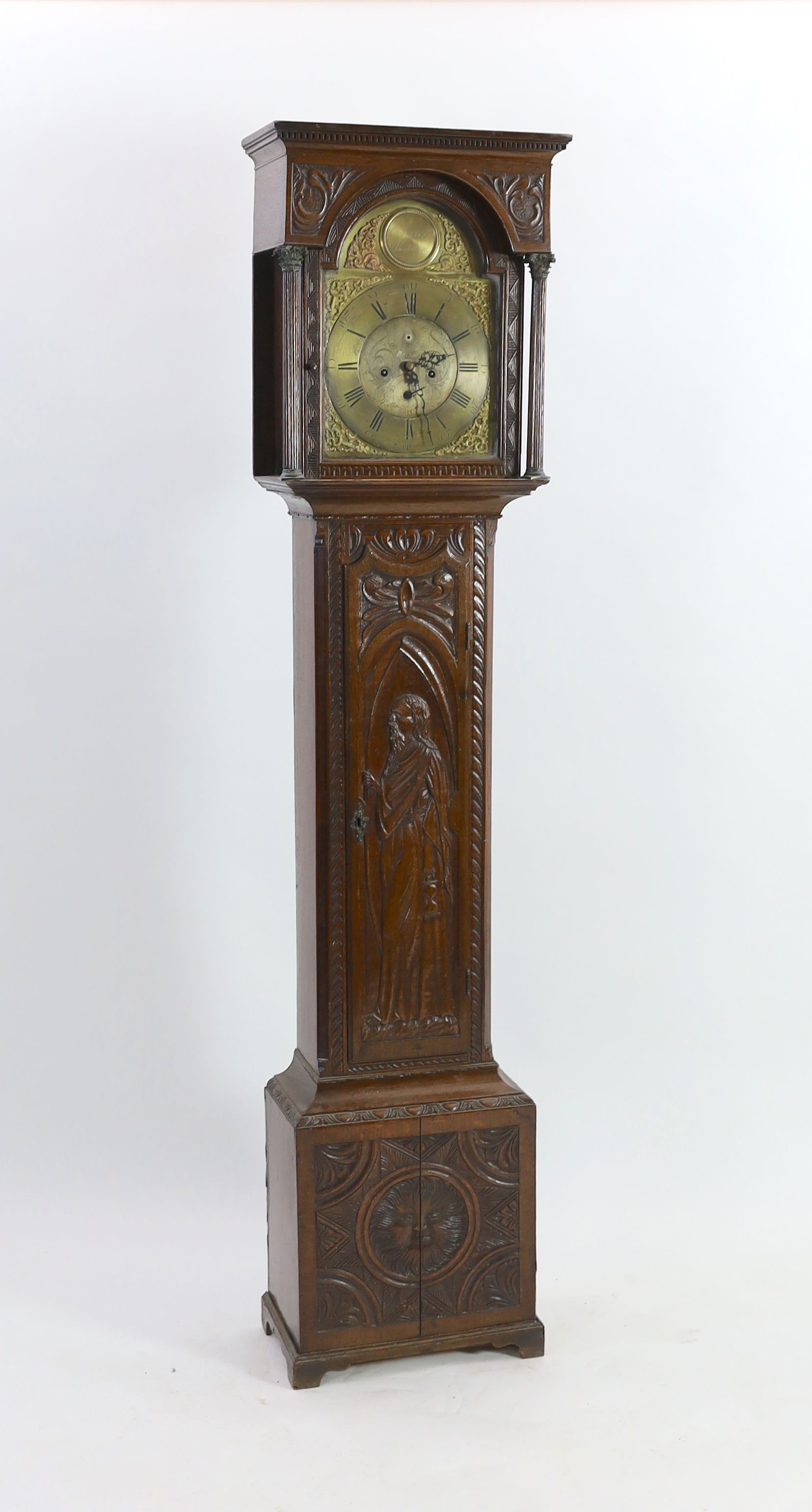 A George III oak eight day longcase clock, the 30cm arched dial marked Arlot, Sunderland, with subsidiary seconds and calendar dials, case 250cm high (later carved)